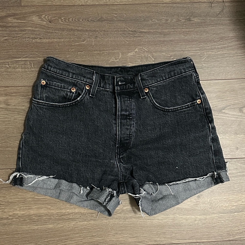 Size 26 Levi’s 501 Button Up Black Distressed Shorts